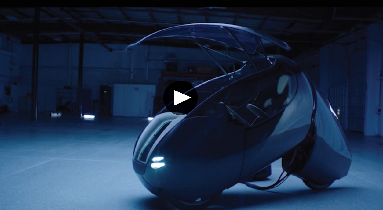 Indigo brand exploration, futuristic vehicle in an open warehouse